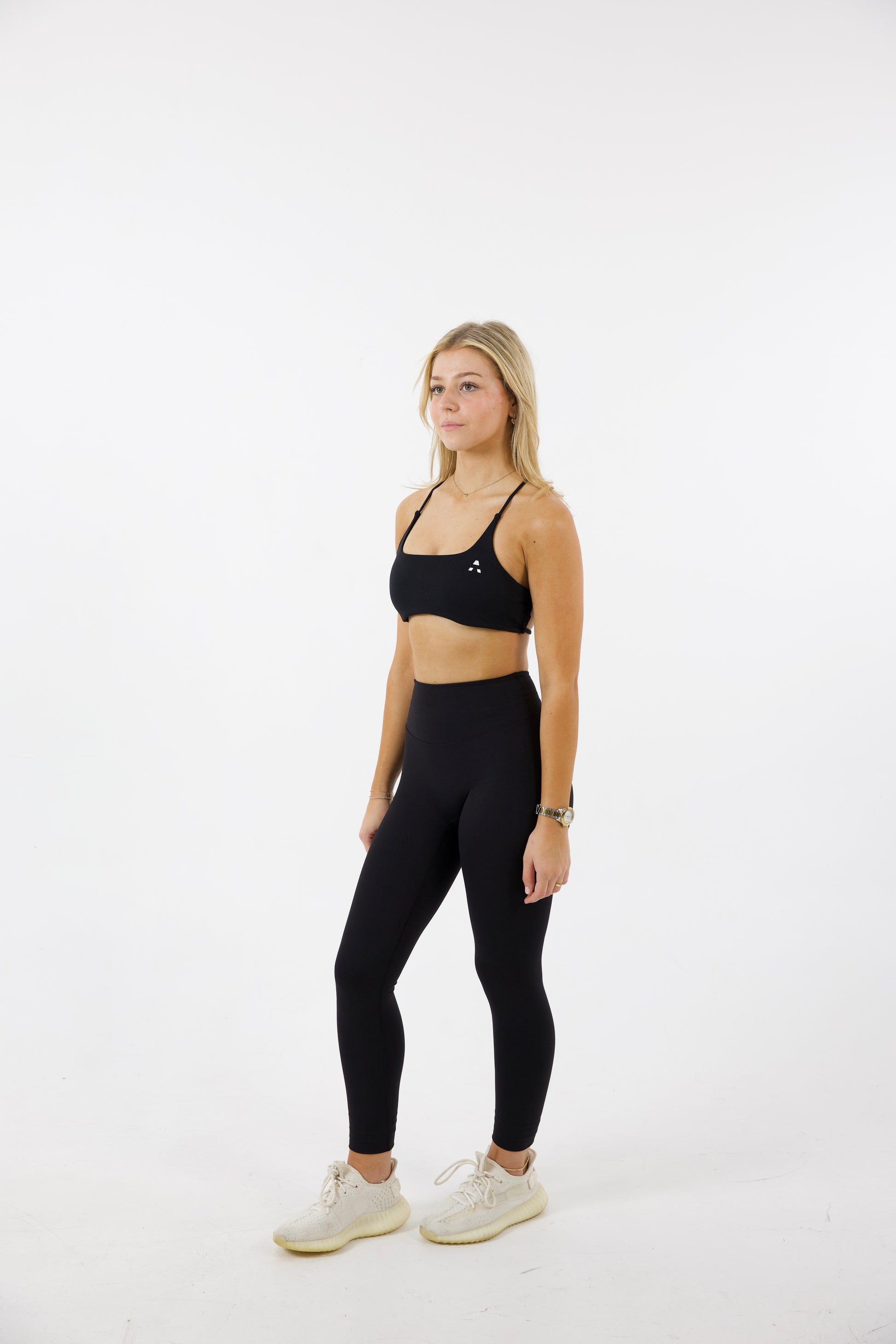 A low-impact sports bra offers light support, ideal for activities like walking, yoga, or light stretching. It provides comfort and freedom of movement while keeping you supported without excess compression.