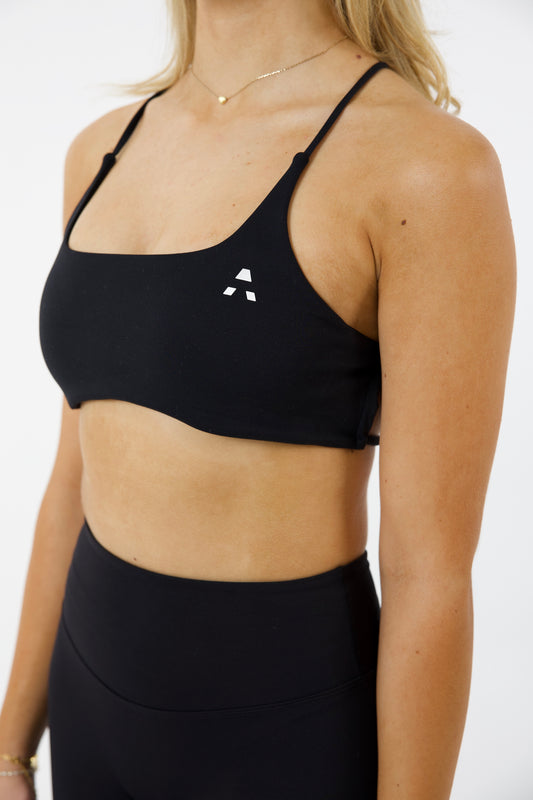 A low-impact sports bra offers light support, ideal for activities like walking, yoga, or light stretching. It provides comfort and freedom of movement while keeping you supported without excess compression.